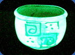 Glow in the dark glass